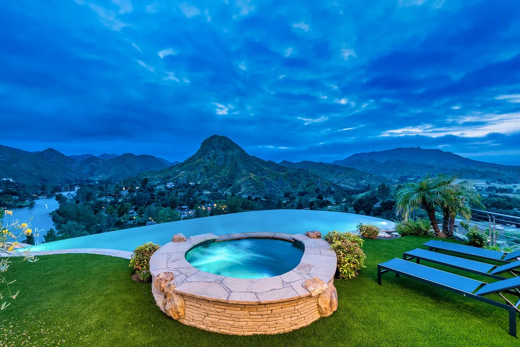 28888 Lake Vista Drive Home in Agoura Hills, California. Welcome to the exclusive ''Lake Vista Estate'' in Malibou Lake, offering a one-of-a-kind trophy masterpiece with breathtaking jet liner views unmatched in Southern California. This brand new European Contemporary home, designed by GoDesign21, features over 6500 square feet of luxurious living space on 3.41 acres of complete privacy in the Santa Monica mountains. 
