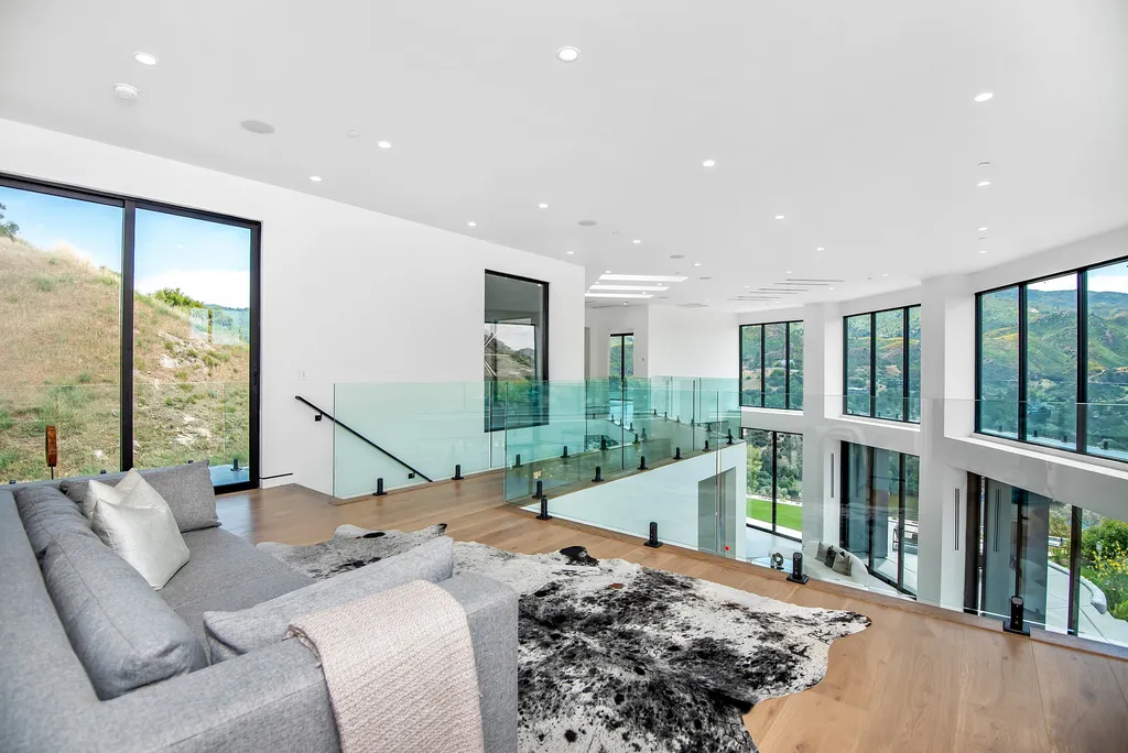 28888 Lake Vista Drive Home in Agoura Hills, California. Welcome to the exclusive ''Lake Vista Estate'' in Malibou Lake, offering a one-of-a-kind trophy masterpiece with breathtaking jet liner views unmatched in Southern California. This brand new European Contemporary home, designed by GoDesign21, features over 6500 square feet of luxurious living space on 3.41 acres of complete privacy in the Santa Monica mountains. 