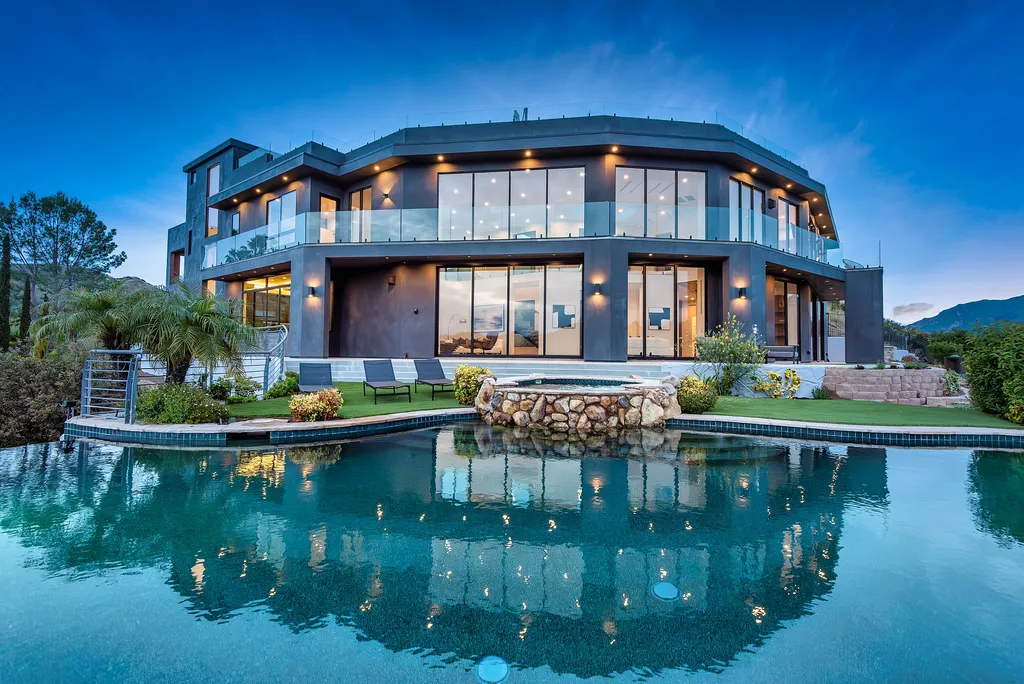 28888 Lake Vista Drive Home in Agoura Hills, California. Welcome to the exclusive ''Lake Vista Estate'' in Malibou Lake, offering a one-of-a-kind trophy masterpiece with breathtaking jet liner views unmatched in Southern California. This brand new European Contemporary home, designed by GoDesign21, features over 6500 square feet of luxurious living space on 3.41 acres of complete privacy in the Santa Monica mountains. 
