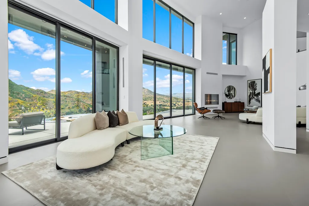 28888 Lake Vista Drive Home in Agoura Hills, California. Welcome to the exclusive ''Lake Vista Estate'' in Malibou Lake, offering a one-of-a-kind trophy masterpiece with breathtaking jet liner views unmatched in Southern California. This brand new European Contemporary home, designed by GoDesign21, features over 6500 square feet of luxurious living space on 3.41 acres of complete privacy in the Santa Monica mountains. 