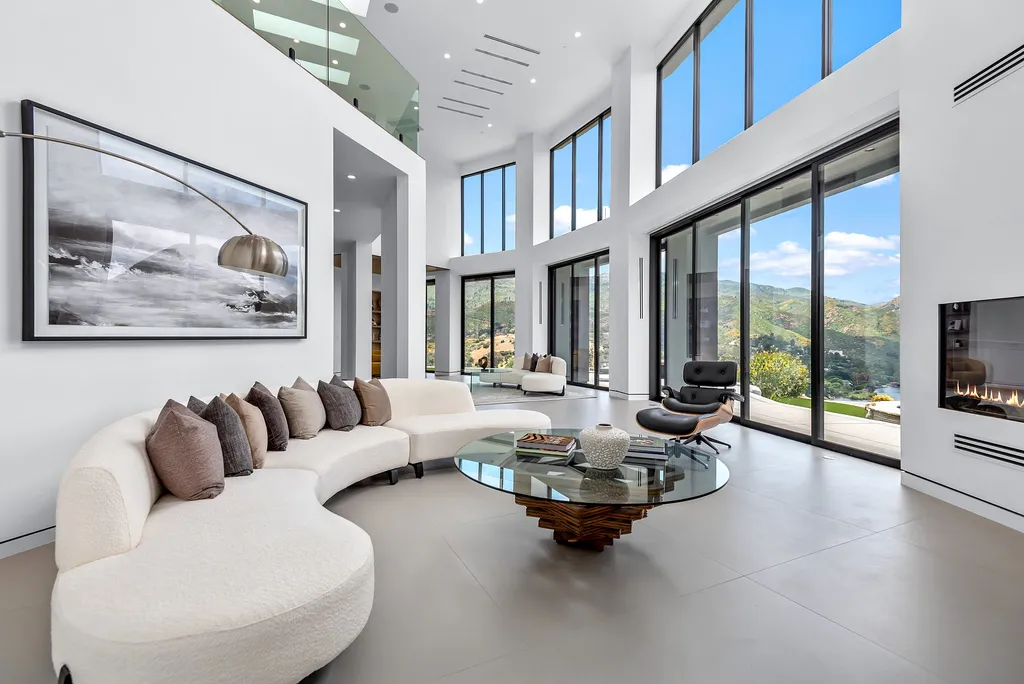 28888 Lake Vista Drive Home in Agoura Hills, California. Welcome to the exclusive ''Lake Vista Estate'' in Malibou Lake, offering a one-of-a-kind trophy masterpiece with breathtaking jet liner views unmatched in Southern California. This brand new European Contemporary home, designed by GoDesign21, features over 6500 square feet of luxurious living space on 3.41 acres of complete privacy in the Santa Monica mountains. 
