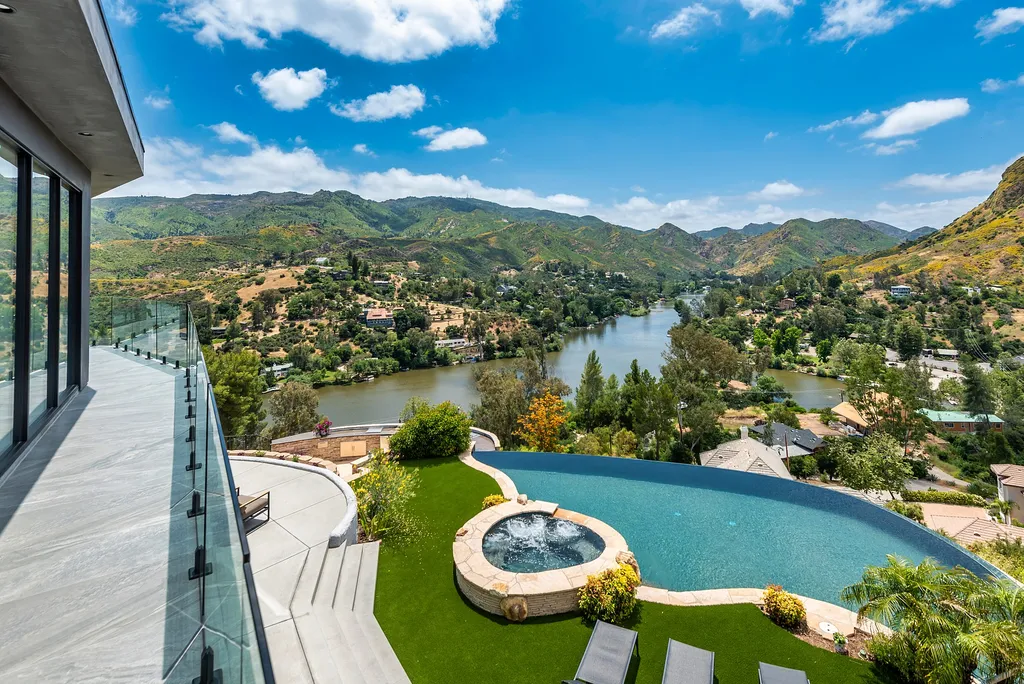 28888 Lake Vista Drive Home in Agoura Hills, California. Welcome to the exclusive ''Lake Vista Estate'' in Malibou Lake, offering a one-of-a-kind trophy masterpiece with breathtaking jet liner views unmatched in Southern California. This brand new European Contemporary home, designed by GoDesign21, features over 6500 square feet of luxurious living space on 3.41 acres of complete privacy in the Santa Monica mountains. 