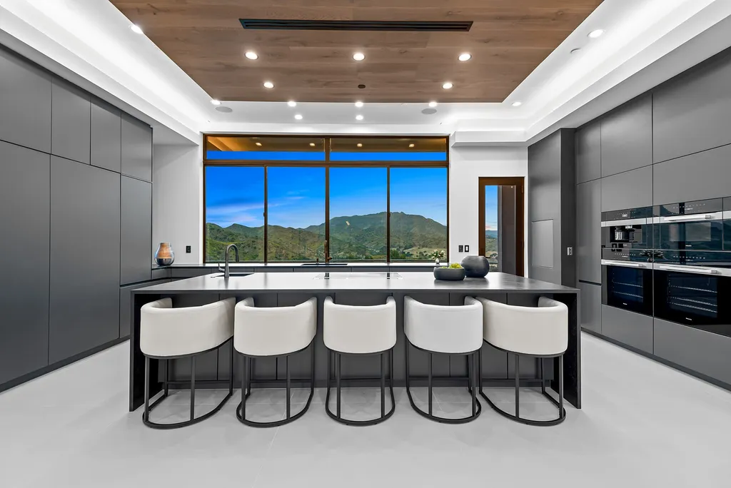 28888 Lake Vista Drive Home in Agoura Hills, California. Welcome to the exclusive ''Lake Vista Estate'' in Malibou Lake, offering a one-of-a-kind trophy masterpiece with breathtaking jet liner views unmatched in Southern California. This brand new European Contemporary home, designed by GoDesign21, features over 6500 square feet of luxurious living space on 3.41 acres of complete privacy in the Santa Monica mountains. 