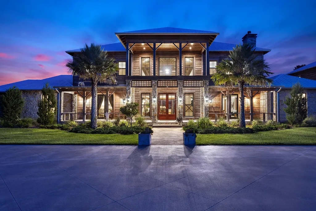 3160 NE 233 Road Trial Home in Okeechobee, Florida. Discover the epitome of refined luxury and countryside charm at PineHaven Ranch, nestled within the prestigious Pine Creek Sporting Club enclave. With 9 bedrooms, 7.1 bathrooms, a private lake, custom cypress accents, and access to elite amenities like the Member's Lodge and equestrian center.