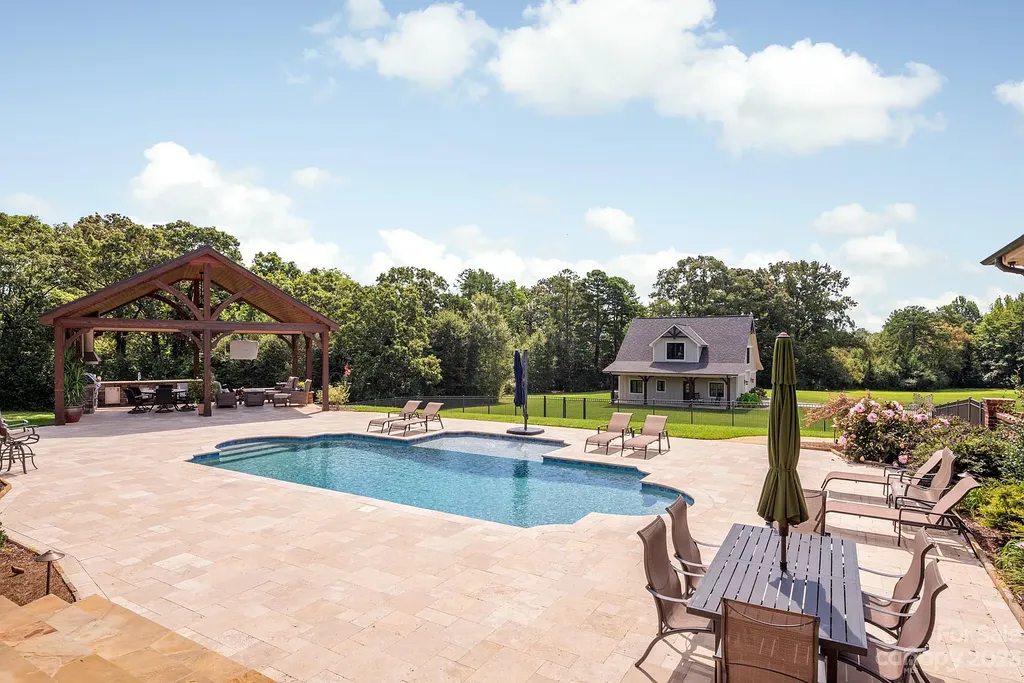 3200 Beaty Road Home in Gastonia, North Carolina. Experience unparalleled luxury living at 3200 Beaty Road, Gaston County's crown jewel. Set on 55 acres of North Carolina's stunning landscape, this estate offers ready-to-go fields, scenic trails, and a paradise for equine and ATV enthusiasts.