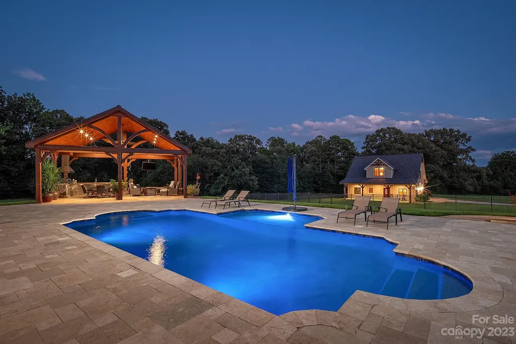 3200 Beaty Road Home in Gastonia, North Carolina. Experience unparalleled luxury living at 3200 Beaty Road, Gaston County's crown jewel. Set on 55 acres of North Carolina's stunning landscape, this estate offers ready-to-go fields, scenic trails, and a paradise for equine and ATV enthusiasts.