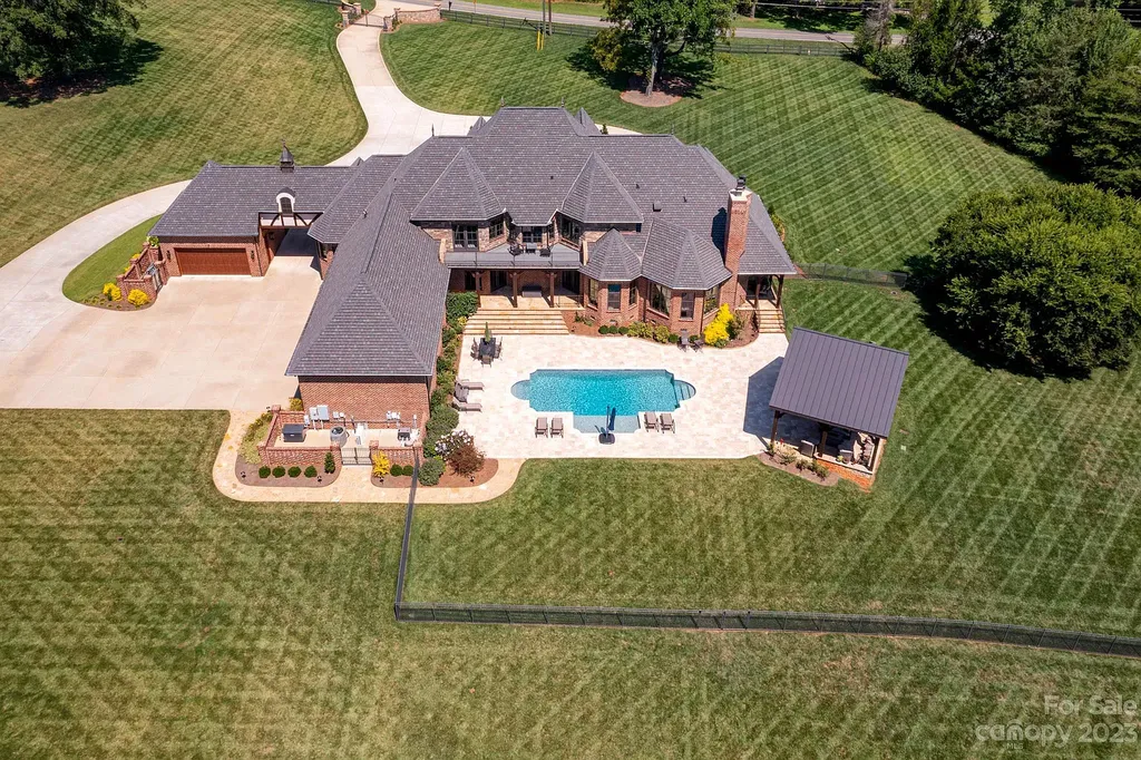 3200 Beaty Road Home in Gastonia, North Carolina. Experience unparalleled luxury living at 3200 Beaty Road, Gaston County's crown jewel. Set on 55 acres of North Carolina's stunning landscape, this estate offers ready-to-go fields, scenic trails, and a paradise for equine and ATV enthusiasts.