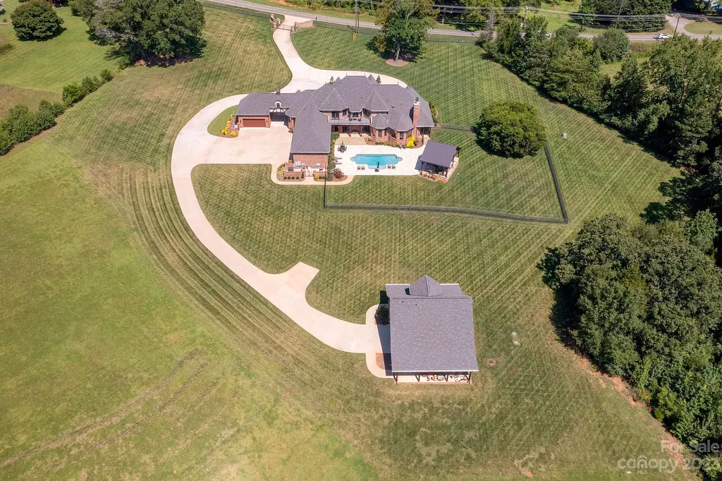 3200 Beaty Road Home in Gastonia, North Carolina. Experience unparalleled luxury living at 3200 Beaty Road, Gaston County's crown jewel. Set on 55 acres of North Carolina's stunning landscape, this estate offers ready-to-go fields, scenic trails, and a paradise for equine and ATV enthusiasts.