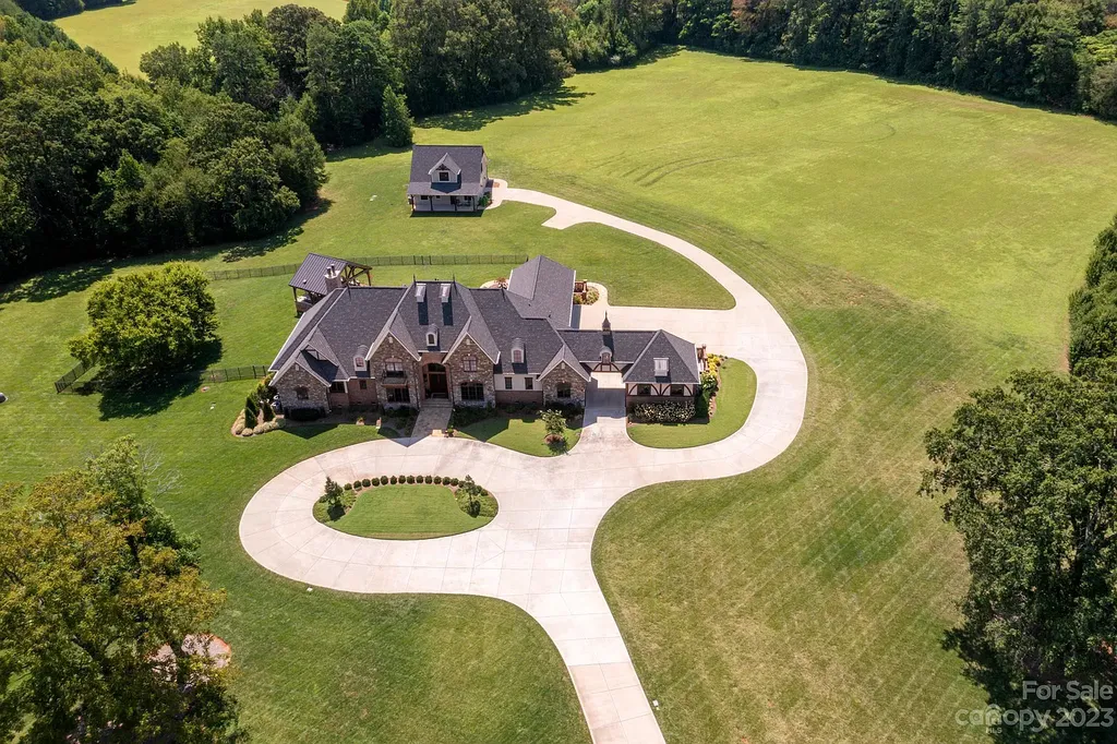 3200 Beaty Road Home in Gastonia, North Carolina. Experience unparalleled luxury living at 3200 Beaty Road, Gaston County's crown jewel. Set on 55 acres of North Carolina's stunning landscape, this estate offers ready-to-go fields, scenic trails, and a paradise for equine and ATV enthusiasts.