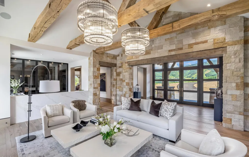 335 Elkhorn Court Home in Avon, Colorado. Discover the epitome of mountain luxury at this secluded Bachelor Gulch estate overlooking Beaver Creek Resort. Offering privacy and sweeping views of the Gore Range, Game Creek Bowl, and more, this alpine haven features ski-in/ski-out access, smart home technology, exquisite design details, and state-of-the-art amenities. 