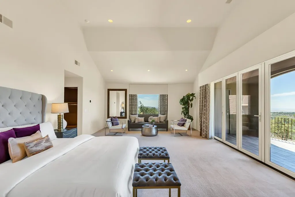 4160 Marble Ridge Road Home in El Dorado Hills, California. Discover the extraordinary 10-acre hilltop estate offering breathtaking views and a resort-like experience. This stately home features massive floor-to-ceiling windows, an elegant living room with a full bar, and a modern great room with a gourmet kitchen.