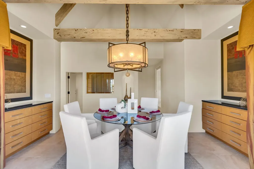 4160 Marble Ridge Road Home in El Dorado Hills, California. Discover the extraordinary 10-acre hilltop estate offering breathtaking views and a resort-like experience. This stately home features massive floor-to-ceiling windows, an elegant living room with a full bar, and a modern great room with a gourmet kitchen.