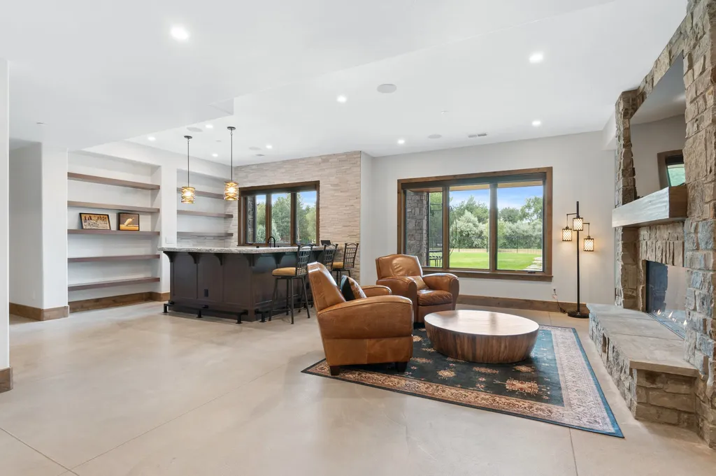 4480 S Holly Street Home in Cherry Hills Village, Colorado. Discover a masterpiece of modern luxury and sustainable living in Cherry Hills Village. This 2022-built home showcases the perfect blend of sophistication and Colorado charm, featuring geothermal heating, Tesla powerwalls, commercial solar panels, and advanced technology. 