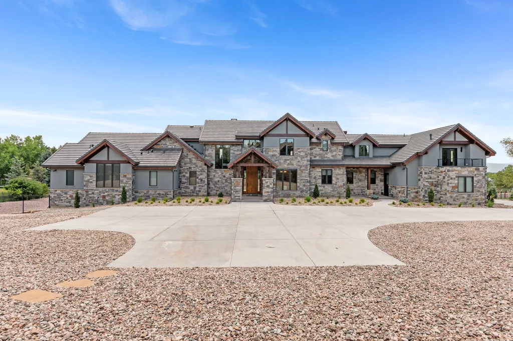 4480 S Holly Street Home in Cherry Hills Village, Colorado. Discover a masterpiece of modern luxury and sustainable living in Cherry Hills Village. This 2022-built home showcases the perfect blend of sophistication and Colorado charm, featuring geothermal heating, Tesla powerwalls, commercial solar panels, and advanced technology. 