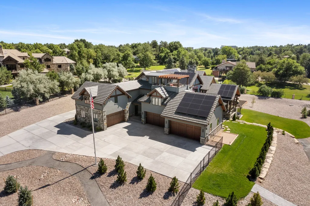 4480 S Holly Street Home in Cherry Hills Village, Colorado. Discover a masterpiece of modern luxury and sustainable living in Cherry Hills Village. This 2022-built home showcases the perfect blend of sophistication and Colorado charm, featuring geothermal heating, Tesla powerwalls, commercial solar panels, and advanced technology. 