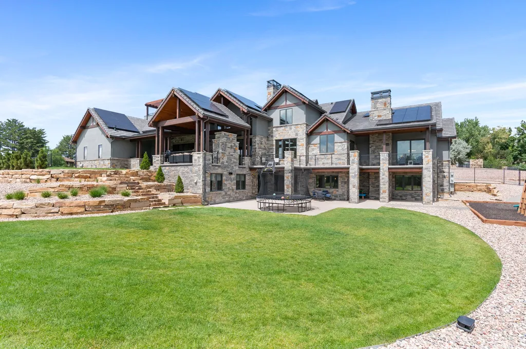 4480 S Holly Street Home in Cherry Hills Village, Colorado. Discover a masterpiece of modern luxury and sustainable living in Cherry Hills Village. This 2022-built home showcases the perfect blend of sophistication and Colorado charm, featuring geothermal heating, Tesla powerwalls, commercial solar panels, and advanced technology. 