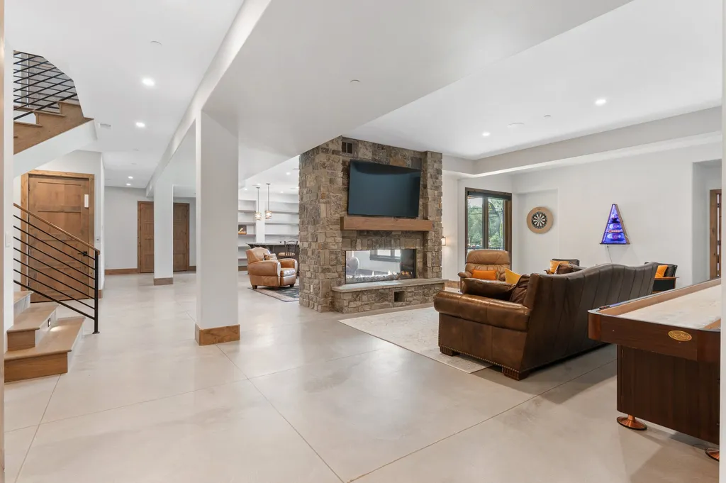 4480 S Holly Street Home in Cherry Hills Village, Colorado. Discover a masterpiece of modern luxury and sustainable living in Cherry Hills Village. This 2022-built home showcases the perfect blend of sophistication and Colorado charm, featuring geothermal heating, Tesla powerwalls, commercial solar panels, and advanced technology. 