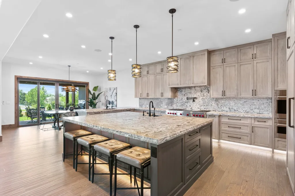 4480 S Holly Street Home in Cherry Hills Village, Colorado. Discover a masterpiece of modern luxury and sustainable living in Cherry Hills Village. This 2022-built home showcases the perfect blend of sophistication and Colorado charm, featuring geothermal heating, Tesla powerwalls, commercial solar panels, and advanced technology. 
