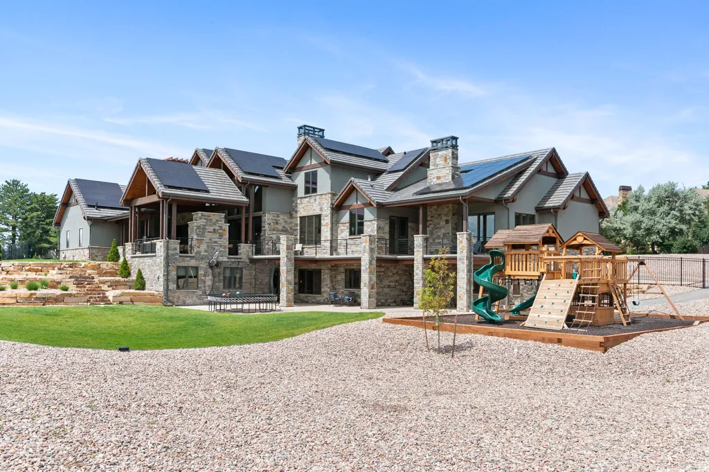 4480 S Holly Street Home in Cherry Hills Village, Colorado. Discover a masterpiece of modern luxury and sustainable living in Cherry Hills Village. This 2022-built home showcases the perfect blend of sophistication and Colorado charm, featuring geothermal heating, Tesla powerwalls, commercial solar panels, and advanced technology. 