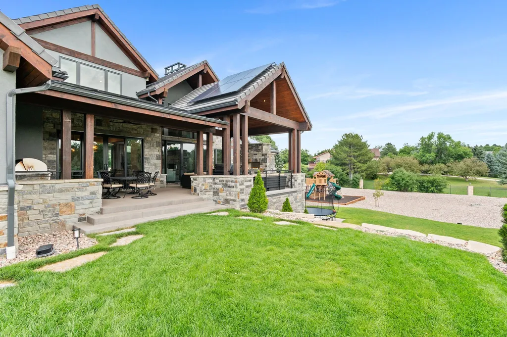 4480 S Holly Street Home in Cherry Hills Village, Colorado. Discover a masterpiece of modern luxury and sustainable living in Cherry Hills Village. This 2022-built home showcases the perfect blend of sophistication and Colorado charm, featuring geothermal heating, Tesla powerwalls, commercial solar panels, and advanced technology. 