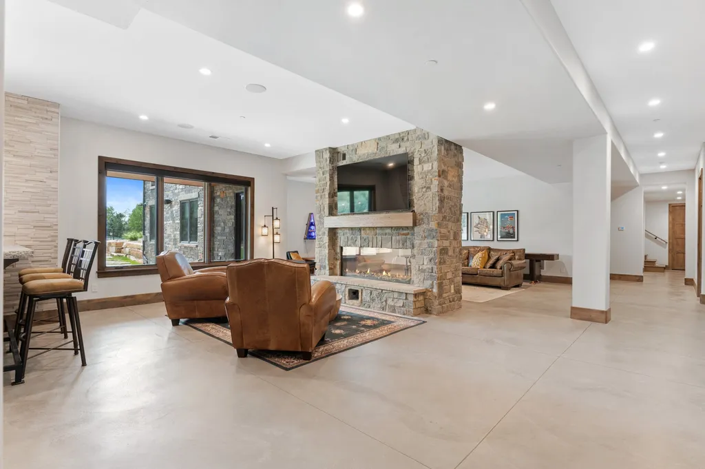 4480 S Holly Street Home in Cherry Hills Village, Colorado. Discover a masterpiece of modern luxury and sustainable living in Cherry Hills Village. This 2022-built home showcases the perfect blend of sophistication and Colorado charm, featuring geothermal heating, Tesla powerwalls, commercial solar panels, and advanced technology. 