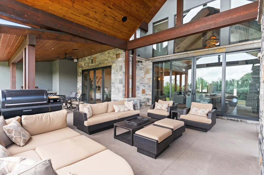 4480 S Holly Street Home in Cherry Hills Village, Colorado. Discover a masterpiece of modern luxury and sustainable living in Cherry Hills Village. This 2022-built home showcases the perfect blend of sophistication and Colorado charm, featuring geothermal heating, Tesla powerwalls, commercial solar panels, and advanced technology. 