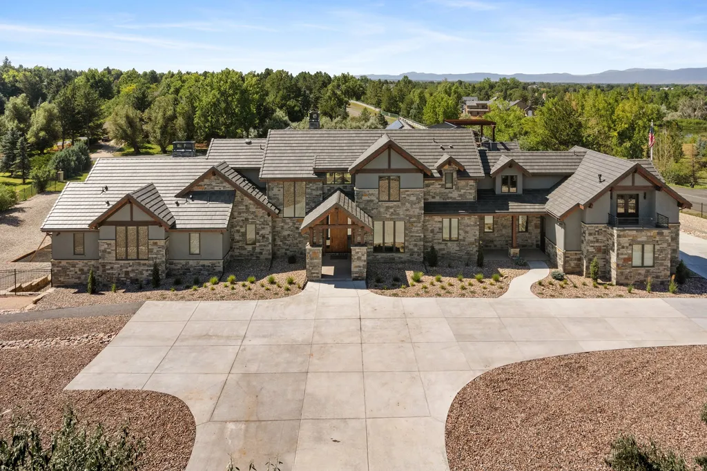 4480 S Holly Street Home in Cherry Hills Village, Colorado. Discover a masterpiece of modern luxury and sustainable living in Cherry Hills Village. This 2022-built home showcases the perfect blend of sophistication and Colorado charm, featuring geothermal heating, Tesla powerwalls, commercial solar panels, and advanced technology. 