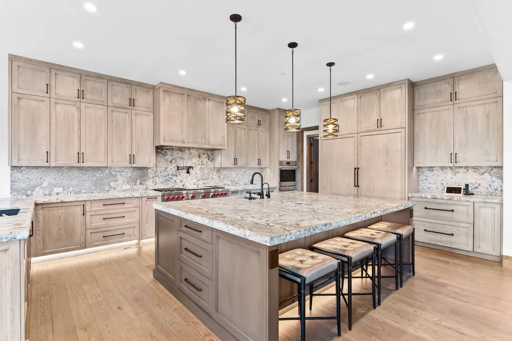 4480 S Holly Street Home in Cherry Hills Village, Colorado. Discover a masterpiece of modern luxury and sustainable living in Cherry Hills Village. This 2022-built home showcases the perfect blend of sophistication and Colorado charm, featuring geothermal heating, Tesla powerwalls, commercial solar panels, and advanced technology. 