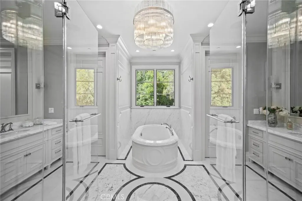 470 Virginia Road Home in San Marino, California. Discover the epitome of modern luxury living in this brand new San Marino home. Built by Rykadan Intl, designed by ilustracion by Jake, and developed by Bowden Development, this 8000 sqft estate offers impeccable finishes, high-end amenities, and an expansive outdoor oasis. With 6 bedrooms, 7.5 baths, a state-of-the-art home theater, gym, and pool, this is the ultimate in convenience and comfort.
