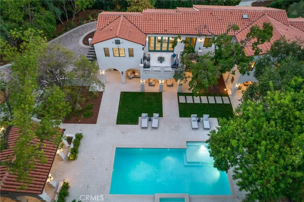 470 Virginia Road Home in San Marino, California. Discover the epitome of modern luxury living in this brand new San Marino home. Built by Rykadan Intl, designed by ilustracion by Jake, and developed by Bowden Development, this 8000 sqft estate offers impeccable finishes, high-end amenities, and an expansive outdoor oasis. With 6 bedrooms, 7.5 baths, a state-of-the-art home theater, gym, and pool, this is the ultimate in convenience and comfort.