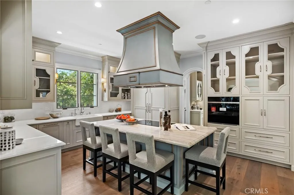 470 Virginia Road Home in San Marino, California. Discover the epitome of modern luxury living in this brand new San Marino home. Built by Rykadan Intl, designed by ilustracion by Jake, and developed by Bowden Development, this 8000 sqft estate offers impeccable finishes, high-end amenities, and an expansive outdoor oasis. With 6 bedrooms, 7.5 baths, a state-of-the-art home theater, gym, and pool, this is the ultimate in convenience and comfort.