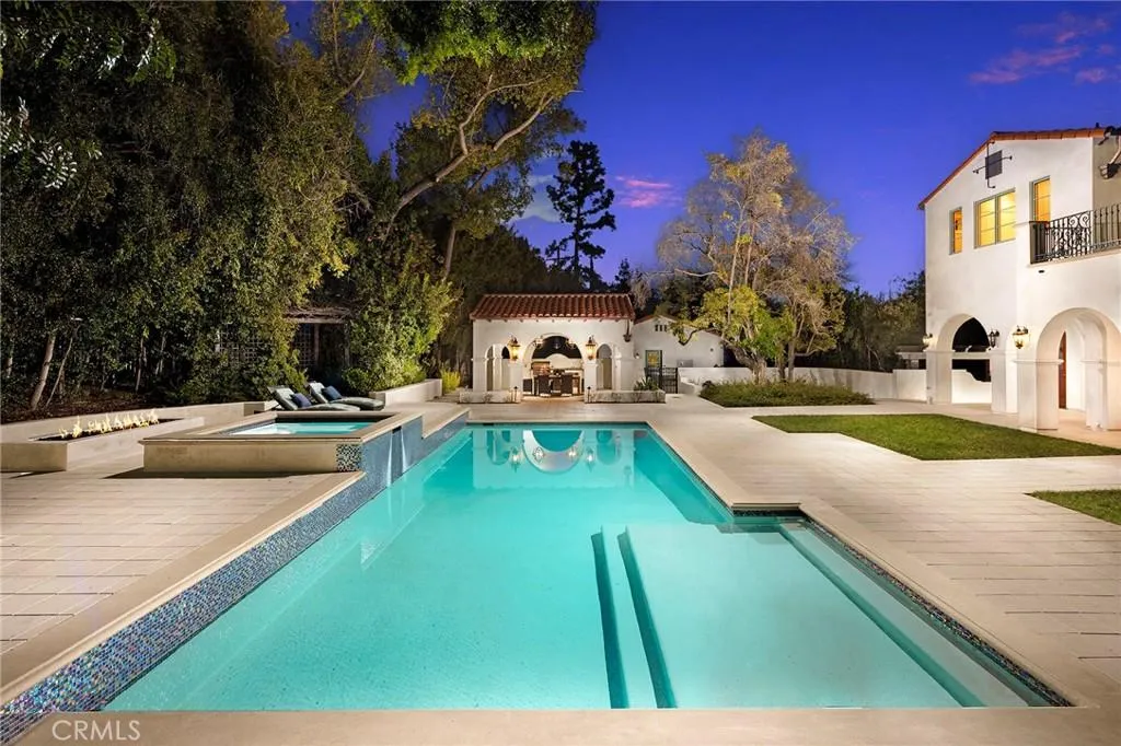 470 Virginia Road Home in San Marino, California. Discover the epitome of modern luxury living in this brand new San Marino home. Built by Rykadan Intl, designed by ilustracion by Jake, and developed by Bowden Development, this 8000 sqft estate offers impeccable finishes, high-end amenities, and an expansive outdoor oasis. With 6 bedrooms, 7.5 baths, a state-of-the-art home theater, gym, and pool, this is the ultimate in convenience and comfort.