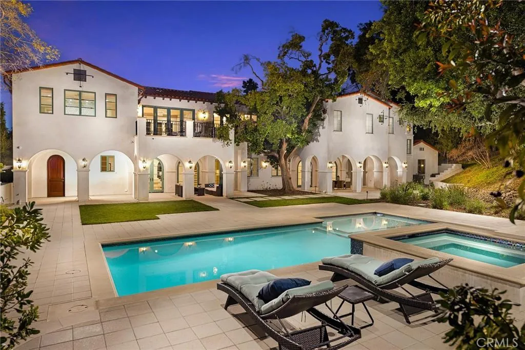 470 Virginia Road Home in San Marino, California. Discover the epitome of modern luxury living in this brand new San Marino home. Built by Rykadan Intl, designed by ilustracion by Jake, and developed by Bowden Development, this 8000 sqft estate offers impeccable finishes, high-end amenities, and an expansive outdoor oasis. With 6 bedrooms, 7.5 baths, a state-of-the-art home theater, gym, and pool, this is the ultimate in convenience and comfort.