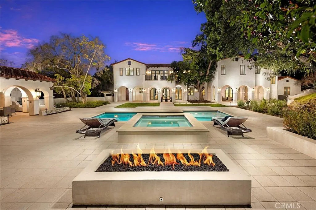 470 Virginia Road Home in San Marino, California. Discover the epitome of modern luxury living in this brand new San Marino home. Built by Rykadan Intl, designed by ilustracion by Jake, and developed by Bowden Development, this 8000 sqft estate offers impeccable finishes, high-end amenities, and an expansive outdoor oasis. With 6 bedrooms, 7.5 baths, a state-of-the-art home theater, gym, and pool, this is the ultimate in convenience and comfort.