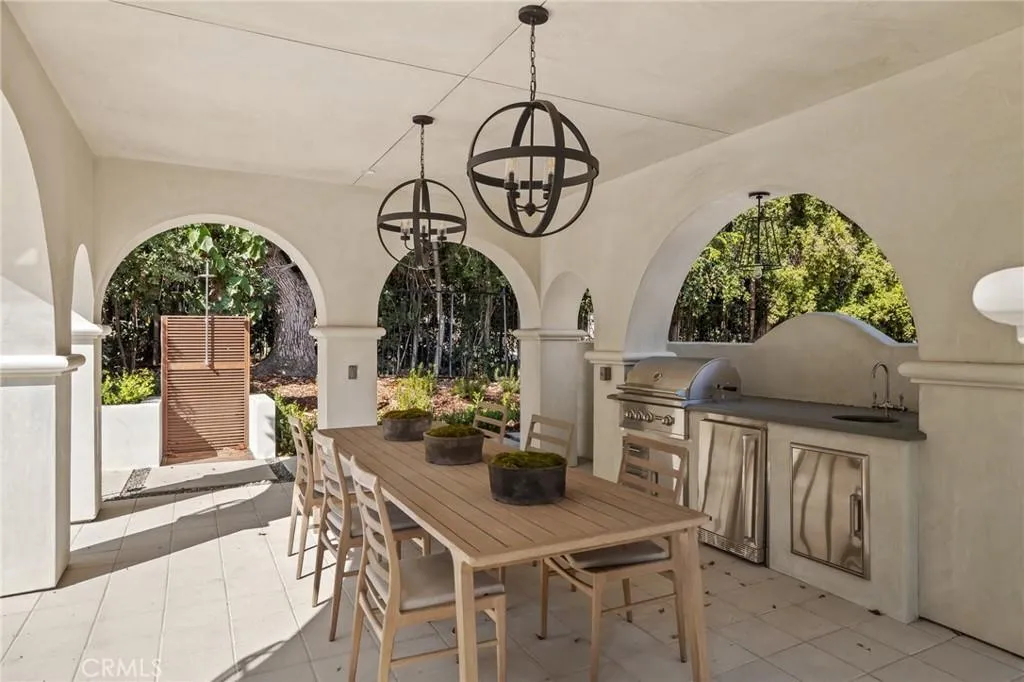 470 Virginia Road Home in San Marino, California. Discover the epitome of modern luxury living in this brand new San Marino home. Built by Rykadan Intl, designed by ilustracion by Jake, and developed by Bowden Development, this 8000 sqft estate offers impeccable finishes, high-end amenities, and an expansive outdoor oasis. With 6 bedrooms, 7.5 baths, a state-of-the-art home theater, gym, and pool, this is the ultimate in convenience and comfort.