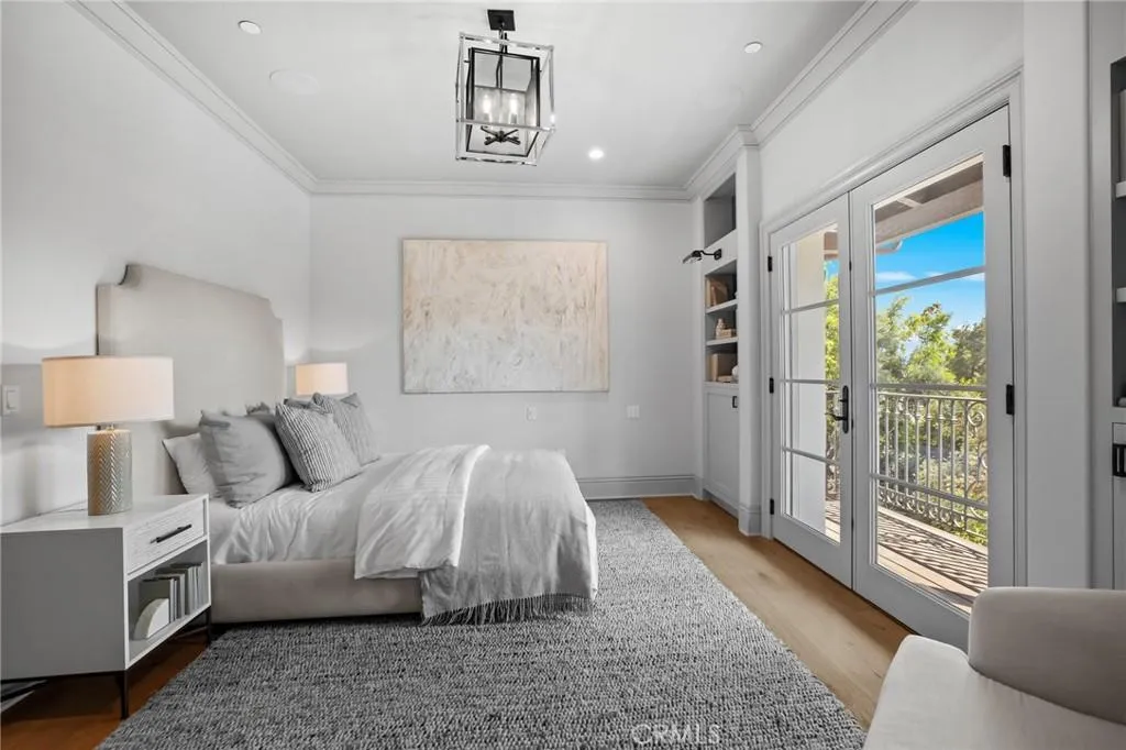 470 Virginia Road Home in San Marino, California. Discover the epitome of modern luxury living in this brand new San Marino home. Built by Rykadan Intl, designed by ilustracion by Jake, and developed by Bowden Development, this 8000 sqft estate offers impeccable finishes, high-end amenities, and an expansive outdoor oasis. With 6 bedrooms, 7.5 baths, a state-of-the-art home theater, gym, and pool, this is the ultimate in convenience and comfort.