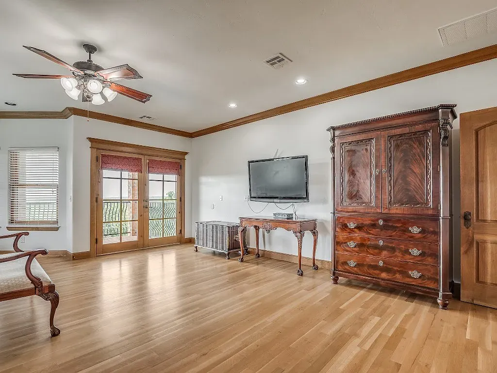 5001 Carrington Place Home in Oklahoma City, Oklahoma. Prepare to be entranced by the awe-inspiring surroundings of this exceptional estate, a harmonious blend of functionality, design, and unparalleled craftsmanship. From the moment you step inside, you'll be greeted by the elegance of quarter-sawn white oak doors, floors, and trim that evoke a sense of refined luxury.