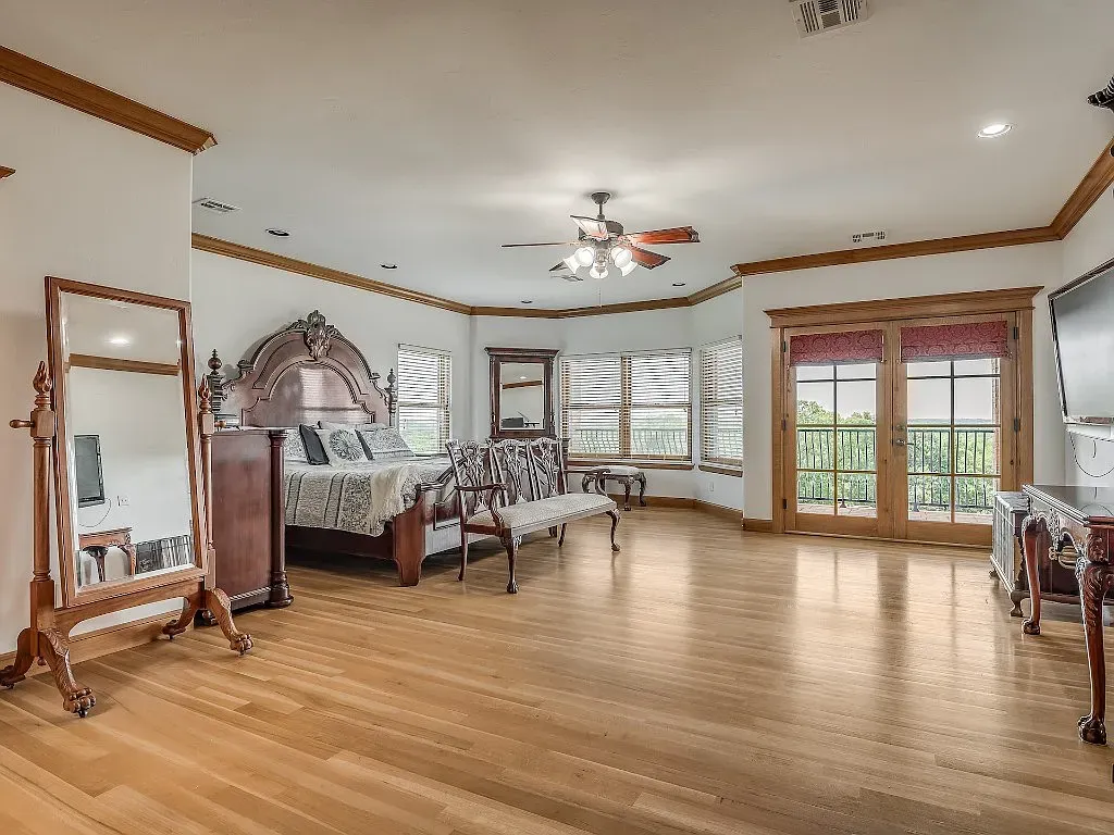 5001 Carrington Place Home in Oklahoma City, Oklahoma. Prepare to be entranced by the awe-inspiring surroundings of this exceptional estate, a harmonious blend of functionality, design, and unparalleled craftsmanship. From the moment you step inside, you'll be greeted by the elegance of quarter-sawn white oak doors, floors, and trim that evoke a sense of refined luxury.