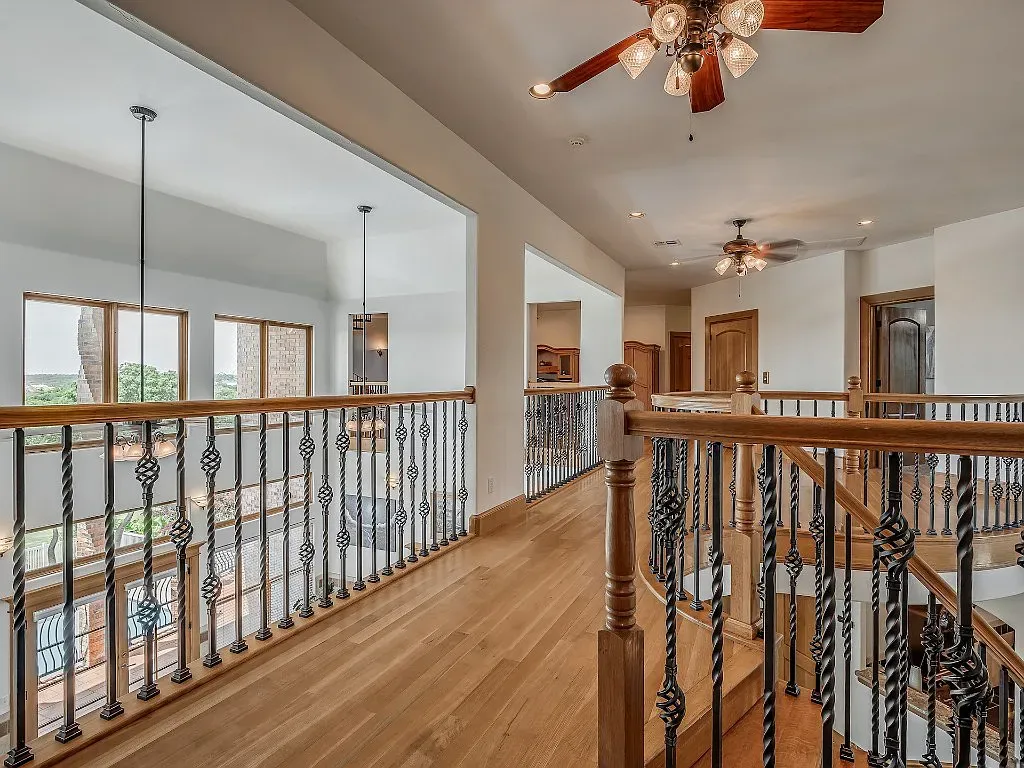 5001 Carrington Place Home in Oklahoma City, Oklahoma. Prepare to be entranced by the awe-inspiring surroundings of this exceptional estate, a harmonious blend of functionality, design, and unparalleled craftsmanship. From the moment you step inside, you'll be greeted by the elegance of quarter-sawn white oak doors, floors, and trim that evoke a sense of refined luxury.