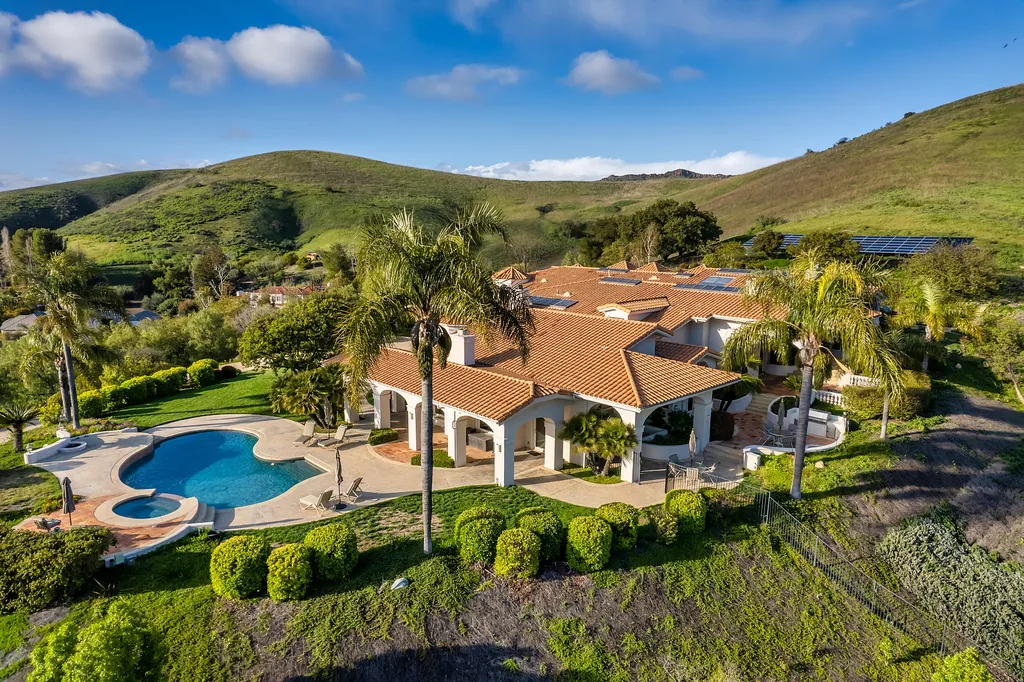 5063 Hunter Valley Lane Home in Westlake Village, California. Discover the epitome of luxury living in this epic Mediterranean compound, nestled on approximately 3.6 acres of prime land behind private gates in guard-gated North Ranch Country Club Estates. Enjoy complete privacy and breathtaking panoramic views from this approximately 9500 square foot hilltop estate.