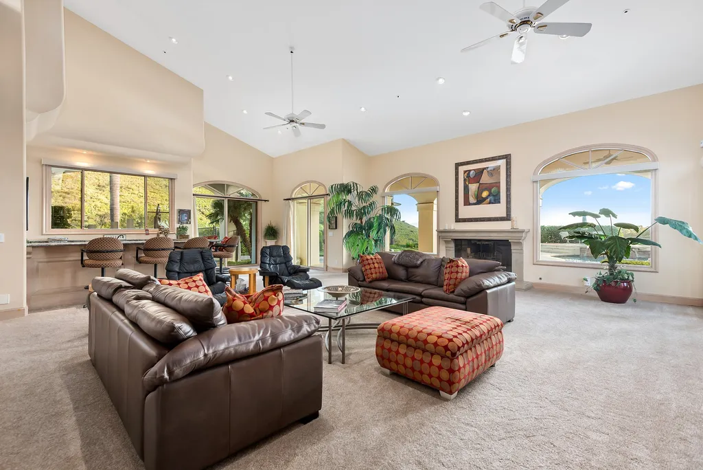 5063 Hunter Valley Lane Home in Westlake Village, California. Discover the epitome of luxury living in this epic Mediterranean compound, nestled on approximately 3.6 acres of prime land behind private gates in guard-gated North Ranch Country Club Estates. Enjoy complete privacy and breathtaking panoramic views from this approximately 9500 square foot hilltop estate.