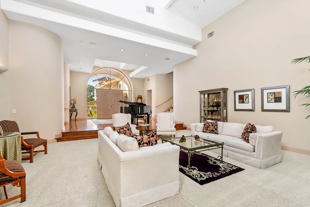 5063 Hunter Valley Lane Home in Westlake Village, California. Discover the epitome of luxury living in this epic Mediterranean compound, nestled on approximately 3.6 acres of prime land behind private gates in guard-gated North Ranch Country Club Estates. Enjoy complete privacy and breathtaking panoramic views from this approximately 9500 square foot hilltop estate.