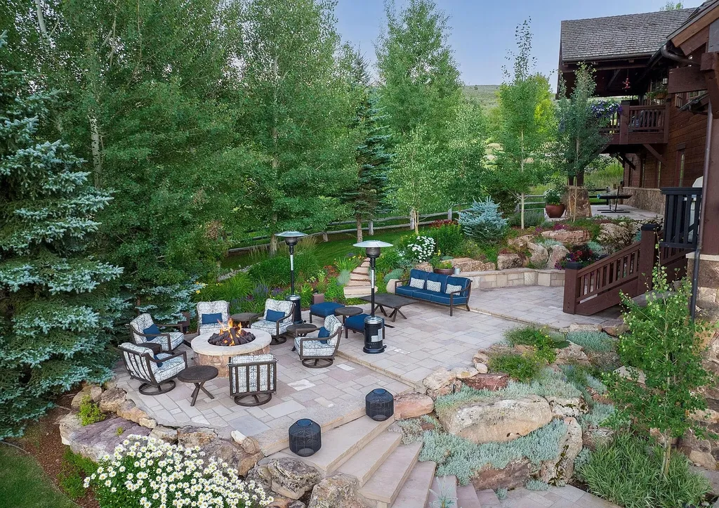 520 Old Creamery Road Home in Edwards, Colorado. Little Bear is a sprawling mountain estate spanning over three acres of Colorado canvas. The property is a true ode to nature, showcasing Colorado's beauty with its mature mountain landscaping, charming gardens, and a curated wildflower garden along the main drive.