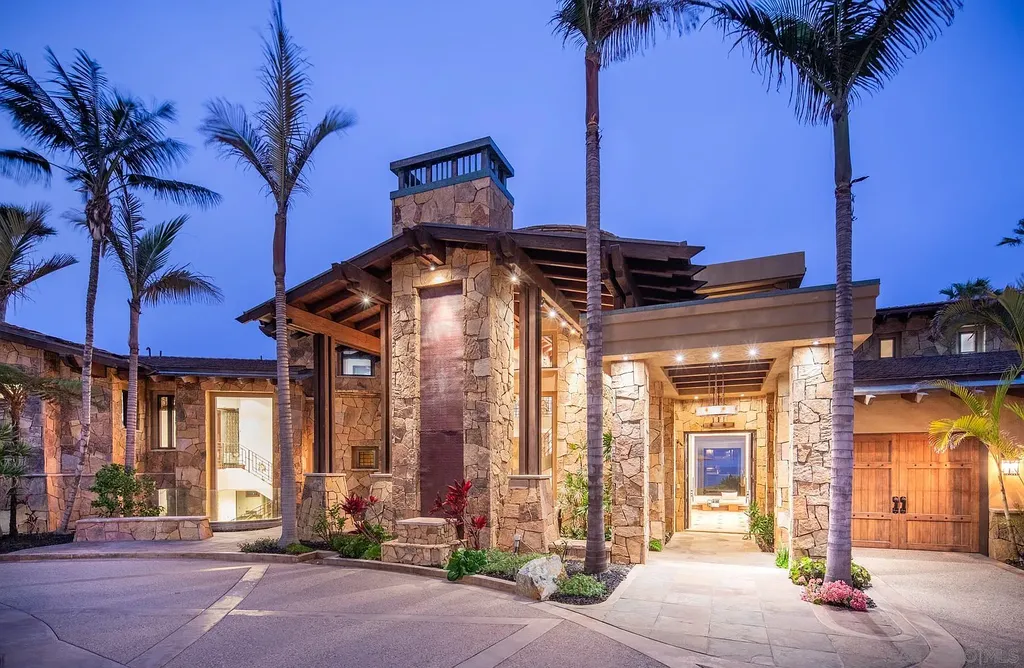 5305 Carlsbad Boulevard Home in Carlsbad, California. Experience the epitome of Southern California coastal living on this extraordinary 1.5-acre oceanfront property. With 165 feet of pristine coastline, panoramic Pacific Ocean views, private beach access, and stunning outdoor spaces, this 5-bedroom estate offers unparalleled luxury.