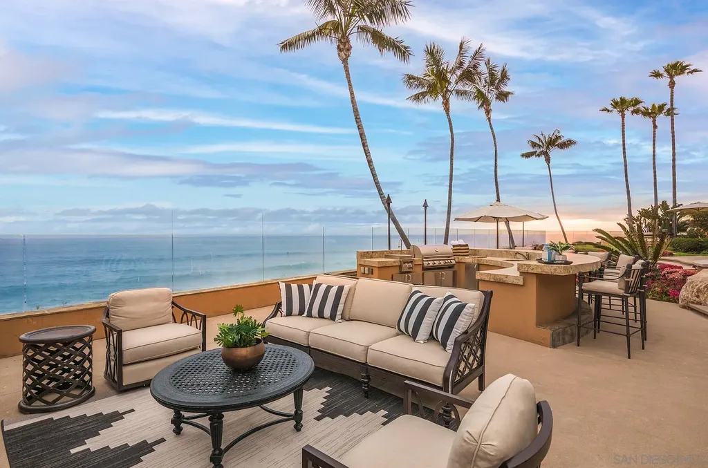 5305 Carlsbad Boulevard Home in Carlsbad, California. Experience the epitome of Southern California coastal living on this extraordinary 1.5-acre oceanfront property. With 165 feet of pristine coastline, panoramic Pacific Ocean views, private beach access, and stunning outdoor spaces, this 5-bedroom estate offers unparalleled luxury.
