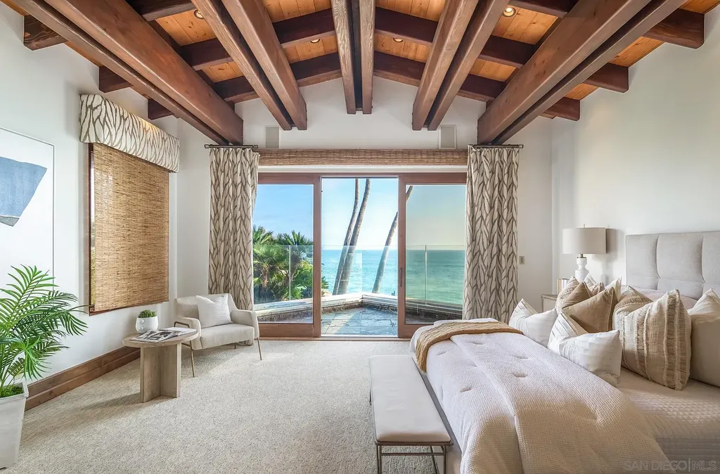 5305 Carlsbad Boulevard Home in Carlsbad, California. Experience the epitome of Southern California coastal living on this extraordinary 1.5-acre oceanfront property. With 165 feet of pristine coastline, panoramic Pacific Ocean views, private beach access, and stunning outdoor spaces, this 5-bedroom estate offers unparalleled luxury.