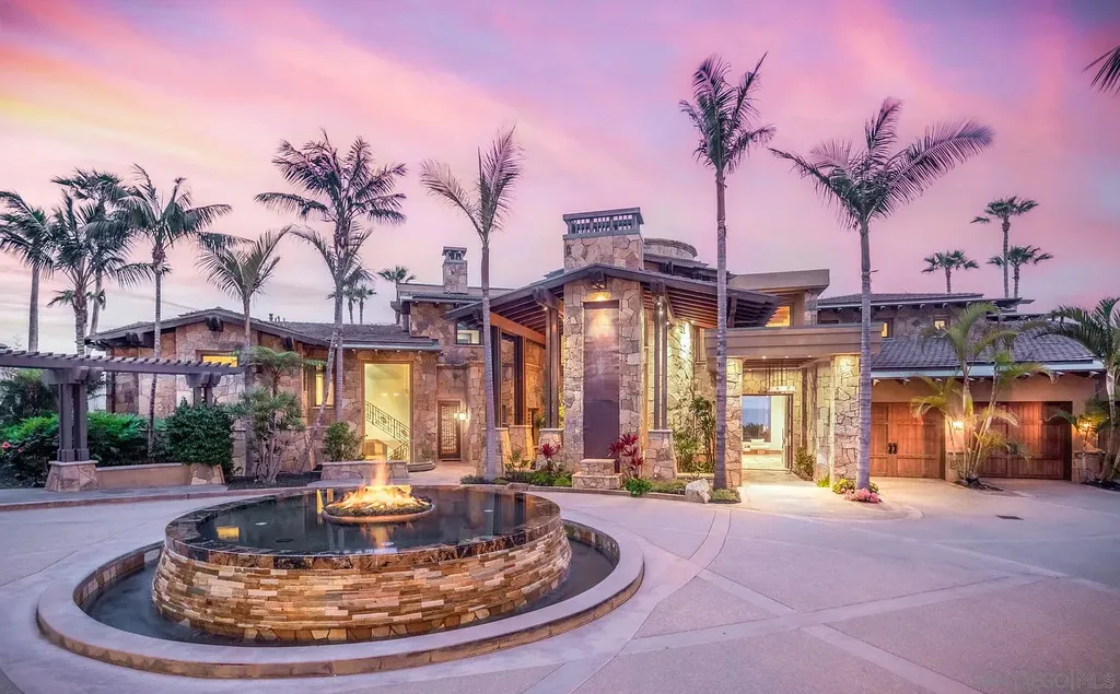 5305 Carlsbad Boulevard Home in Carlsbad, California. Experience the epitome of Southern California coastal living on this extraordinary 1.5-acre oceanfront property. With 165 feet of pristine coastline, panoramic Pacific Ocean views, private beach access, and stunning outdoor spaces, this 5-bedroom estate offers unparalleled luxury.