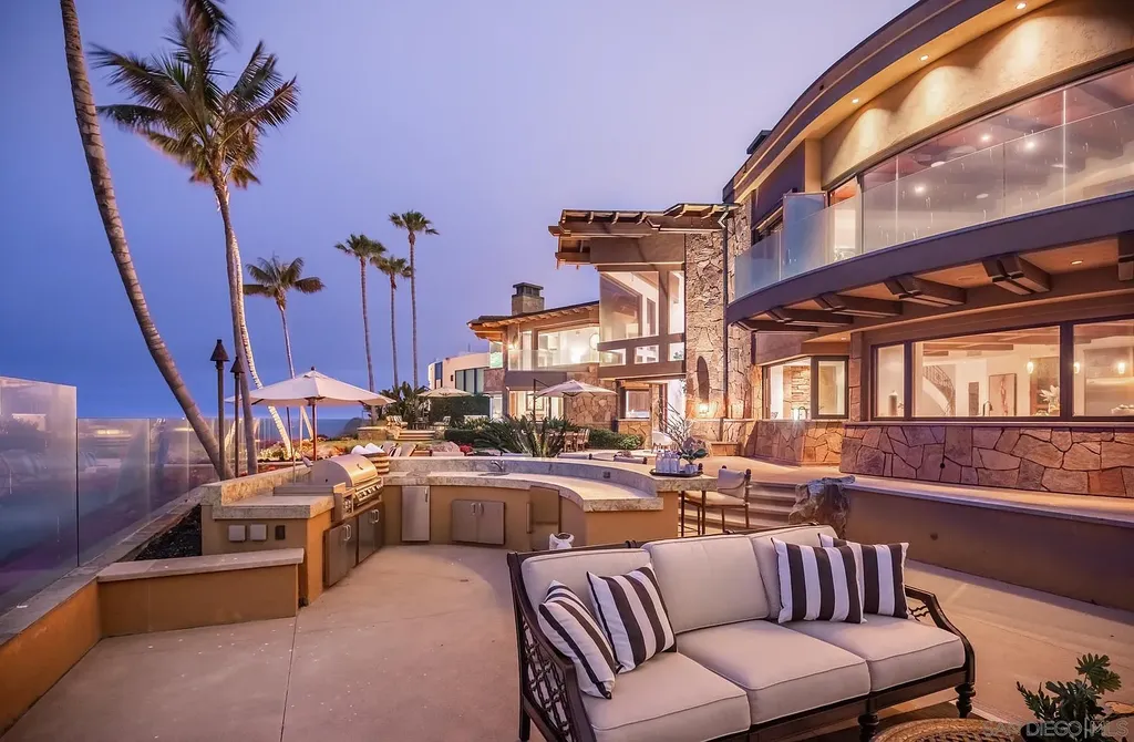 5305 Carlsbad Boulevard Home in Carlsbad, California. Experience the epitome of Southern California coastal living on this extraordinary 1.5-acre oceanfront property. With 165 feet of pristine coastline, panoramic Pacific Ocean views, private beach access, and stunning outdoor spaces, this 5-bedroom estate offers unparalleled luxury.