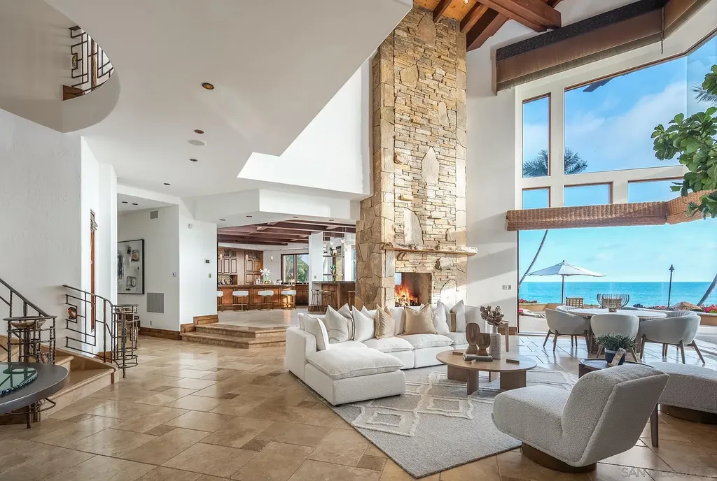 5305 Carlsbad Boulevard Home in Carlsbad, California. Experience the epitome of Southern California coastal living on this extraordinary 1.5-acre oceanfront property. With 165 feet of pristine coastline, panoramic Pacific Ocean views, private beach access, and stunning outdoor spaces, this 5-bedroom estate offers unparalleled luxury.