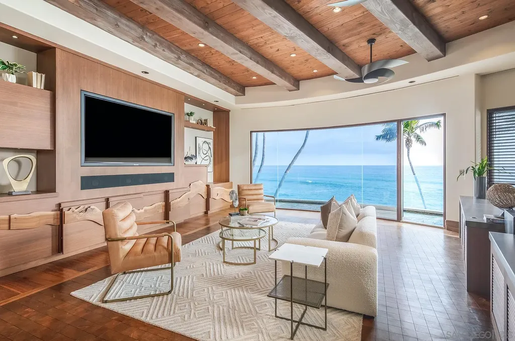 5305 Carlsbad Boulevard Home in Carlsbad, California. Experience the epitome of Southern California coastal living on this extraordinary 1.5-acre oceanfront property. With 165 feet of pristine coastline, panoramic Pacific Ocean views, private beach access, and stunning outdoor spaces, this 5-bedroom estate offers unparalleled luxury.
